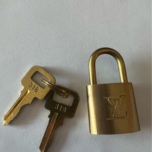 Louis Vuitton lock and key set #318